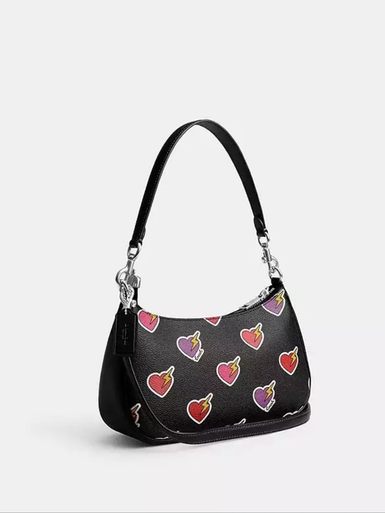 Coach Handbags - Coach Black Pebbled Leather Heart Teri Bag